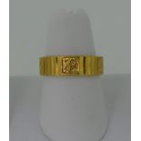 A 22ct yellow gold Wedding Band, with reeded and foliate decoration, 5.7mm wide, Size N, approx