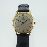 An Omega Automatic gold plated gentleman’s Wristwatch, the champagne dial with gilt Arabic and baton