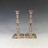 A pair of Elizabeth II silver Candlesticks, by Barker Ellis Silver Co., hallmarked 1974/5, fluted