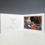 H.M.Queen Elizabeth II and H.R.H.The Duke of Edinburgh, signed 2003 Christmas card with twin gilt