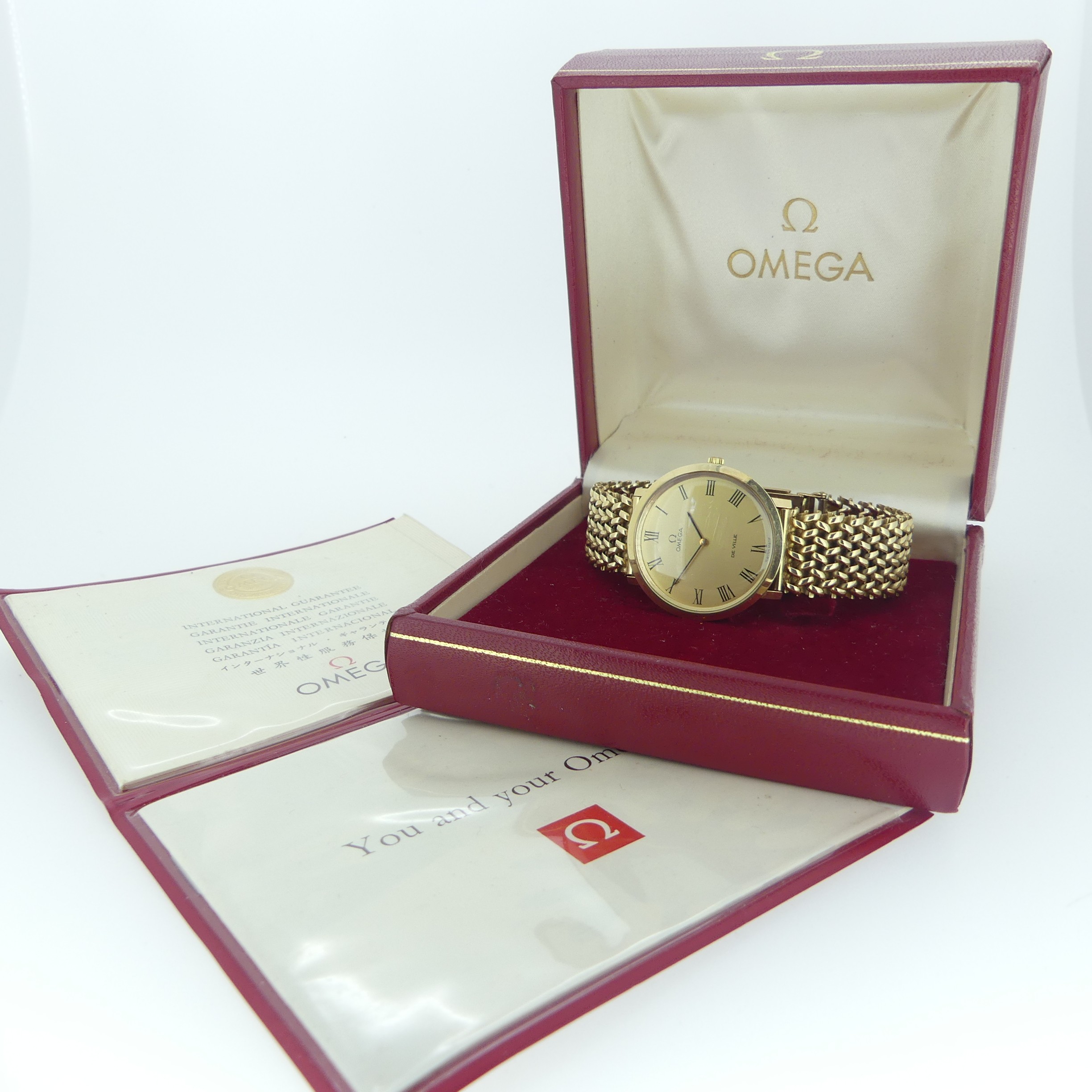 A 9ct gold Omega De Ville gentleman's Wristwatch, circa 1970, with gilt dial and black Roman