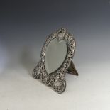 A late Victorian silver mounted Easel Mirror, by William Comyns & Sons, hallmarked London, 1892, the