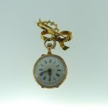 A continental gold Fob Watch and Brooch, the case with white enamel dial and rose cut diamond set '