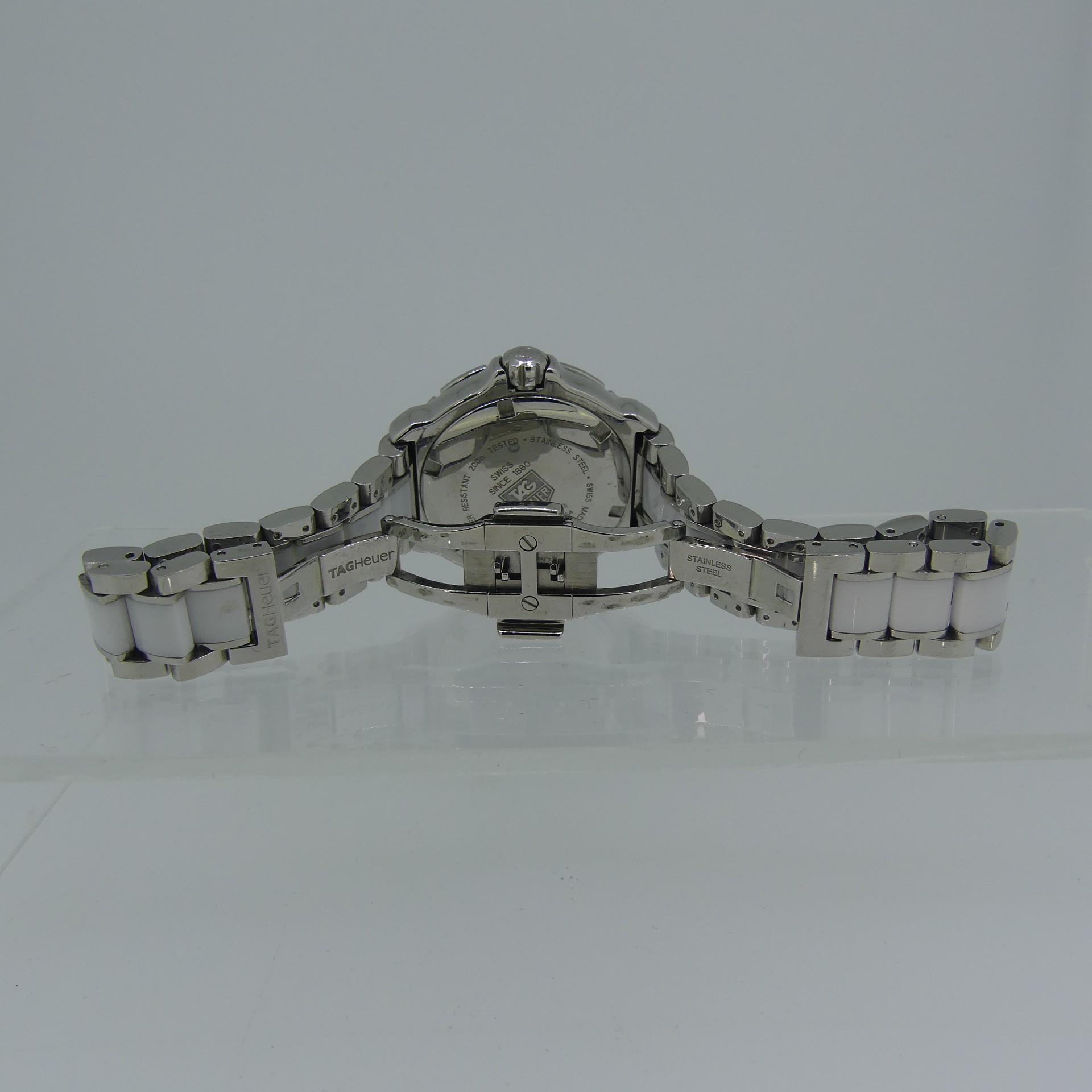 Tag Heuer : a lady's stainless steel and white ceramic Formula 1 ‘Sparkling’ quartz bracelet - Image 6 of 6