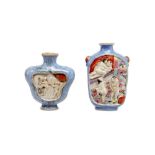 TWO CHINESE MOULDED FAMILLE ROSE SNUFF BOTTLES