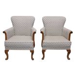 A PAIR OF 19TH CENTURY STYLE WALNUT ARMCHAIRS