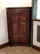 A 19TH CENTURY AND LATER MAHOGANY STANDING CORNER CUPBOARD