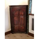 A 19TH CENTURY AND LATER MAHOGANY STANDING CORNER CUPBOARD