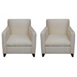 A PAIR OF KINGCOME SOFAS CREAM UPHOLSTERED ARMCHAIRS