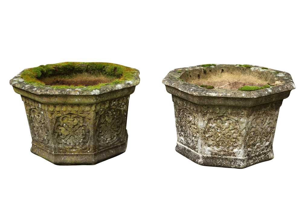 A PAIR OF RECONSTITUTED STONE GARDEN PLANTERS