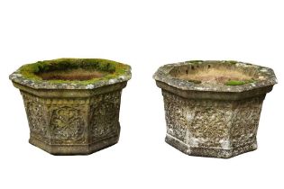 A PAIR OF RECONSTITUTED STONE GARDEN PLANTERS