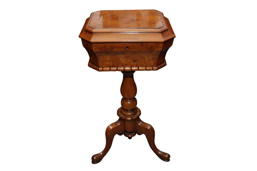 A WILLIAM IV FIGURED WALNUT TEAPOY