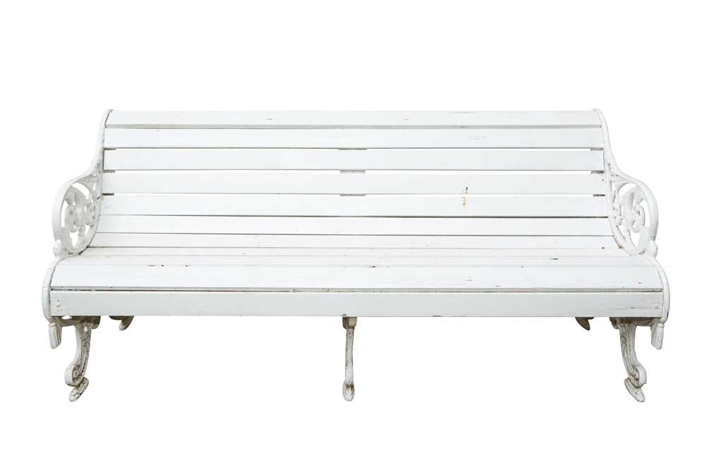 A COALBROOKDALE STYLE WHITE PAINTED CAST IRON GARDEN BENCH