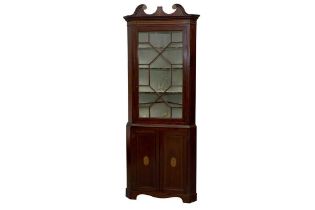 A GEORGE III MAHOGANY AND MARQUETRY INLAID CORNER CABINET