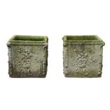 A PAIR OF RECONSTITUTED STONE GARDEN PLANTERS