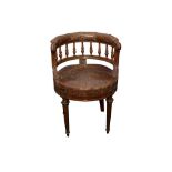 A FRENCH MAHOGANY TUB ARMCHAIR, IN THE LOUIS XVI TASTE, 20TH CENTURY