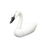 A CARVED AND PAINTED WOODEN DECOY SWAN