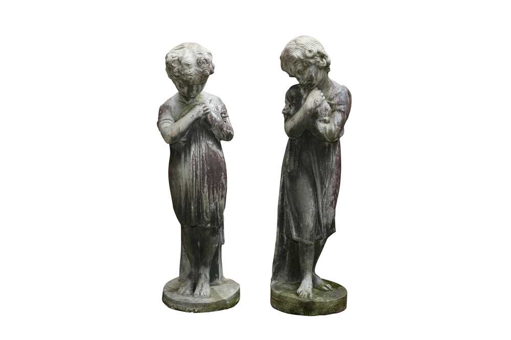 A PAIR OF LEAD GARDEN FIGURES OF CHILDREN