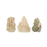 THREE CHINESE PALE CELADON JADE CARVINGS.