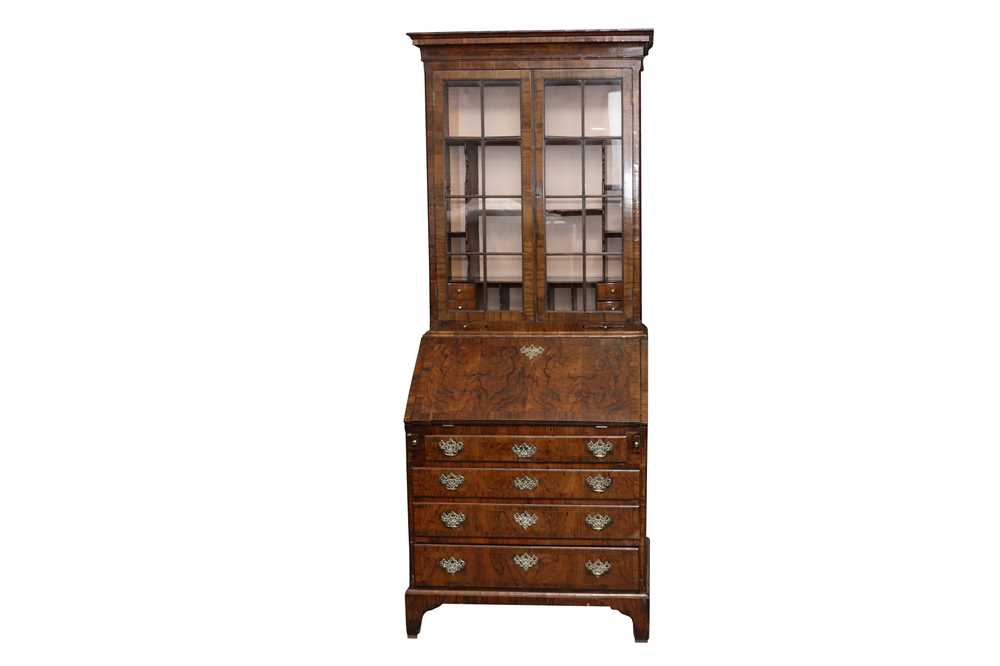 A GEORGE II AND LATER FIGURED WALNUT BUREAU BOOKCASE OF NARROW PROPORTIONS