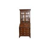 A GEORGE II AND LATER FIGURED WALNUT BUREAU BOOKCASE OF NARROW PROPORTIONS