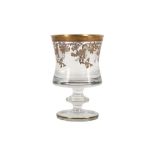 A LARGE GILT GLASS GOBLET