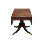 A REGENCY MAHOGANY DROP LEAF BREAKFAST TABLE