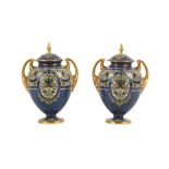 A PAIR OF ROYAL WORCESTER PORCELAIN URNS AND COVERS, LATE 19TH CENTURY