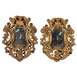 A PAIR OF CONTINENTAL GILTWOOD BAROQUE TASTE HINGED PIER MIRRORS, 19TH CENTURY