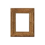 A FRENCH 18TH CENTURY STYLE RÉGENCE CARVED GILDED COMPOSITION FRAME