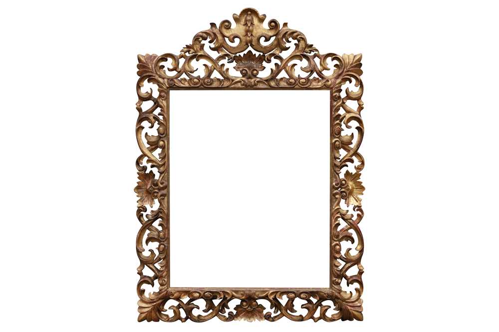 AN ITALIAN FLORENTINE 19TH CENTURY CARVED, PIERCED AND GILDED FRAME