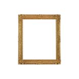AN ENGLISH 19TH CENTURY LOUIS XIV CARVED, PIERCED AND GILDED FRAME