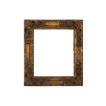 A FRENCH OAK LOUIS XIV CARVED AND GILDED LE BRUN FRAME