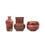 THREE CHINESE COPPER RED-GLAZED SCHOLAR'S DESK ITEMS.