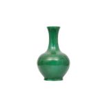 A CHINESE APPLE GREEN-GLAZED VASE.