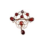 A GARNET BROOCH