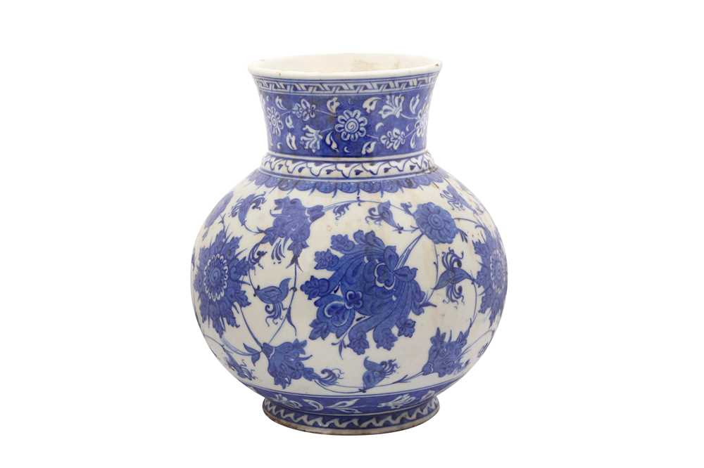 A BLUE AND WHITE IZNIK-REVIVAL POTTERY VASE WITH CHINESE-INSPIRED LOTUS MOTIF Ottoman Turkey, 19th c