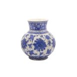 A BLUE AND WHITE IZNIK-REVIVAL POTTERY VASE WITH CHINESE-INSPIRED LOTUS MOTIF Ottoman Turkey, 19th c