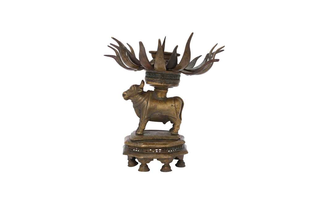 A RITUAL BRASS CANDLE HOLDER WITH NANDI THE BULL Possibly Southern India, late 18th - 19th century - Image 6 of 8