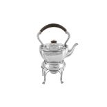 A George V sterling silver kettle on burner stand, Birmingham 1910 by Williams Birmingham Ltd