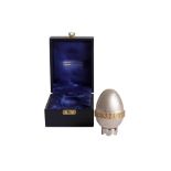 A cased Elizabeth II parcel gilt sterling silver surprise egg, London 1984 by Christopher Nigel Lawr