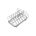 A George IV sterling silver seven bar toast rack, Sheffield 1821 by Thomas and John Settle