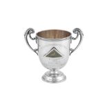 Philately interest – A George V sterling silver twin handled presentation cup, London 1923 by Searle