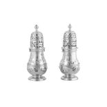 A pair of Queen Anne Britannia standard silver pepper casters, London probably 1710 probably by Chri