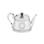 A late 19th century Indian Colonial silver teapot, Madras circa 1900 by T.R. Tawker and Sons