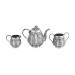 A late 19th / early 20th century Anglo - Indian unmarked silver three-piece tea service, Lucknow cir