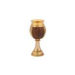 A George V sterling silver gilt coconut cup, London 1928 by Carrington and Co