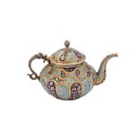 An early 20th century Anglo – Indian unmarked silver parcel gilt and enamel teapot, Kashmir, Srinaga