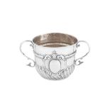 A William III Britannia standard silver twin handled porringer or cup, London 1700 by Edward Wimans