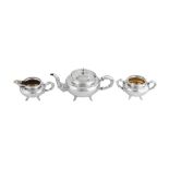 An early 20th century Chinese Export silver three-piece tea service, Canton circa 1910 retailed by W